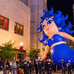 Grand Illumination Parade in Downtown Norfolk with holiday floats and lights.