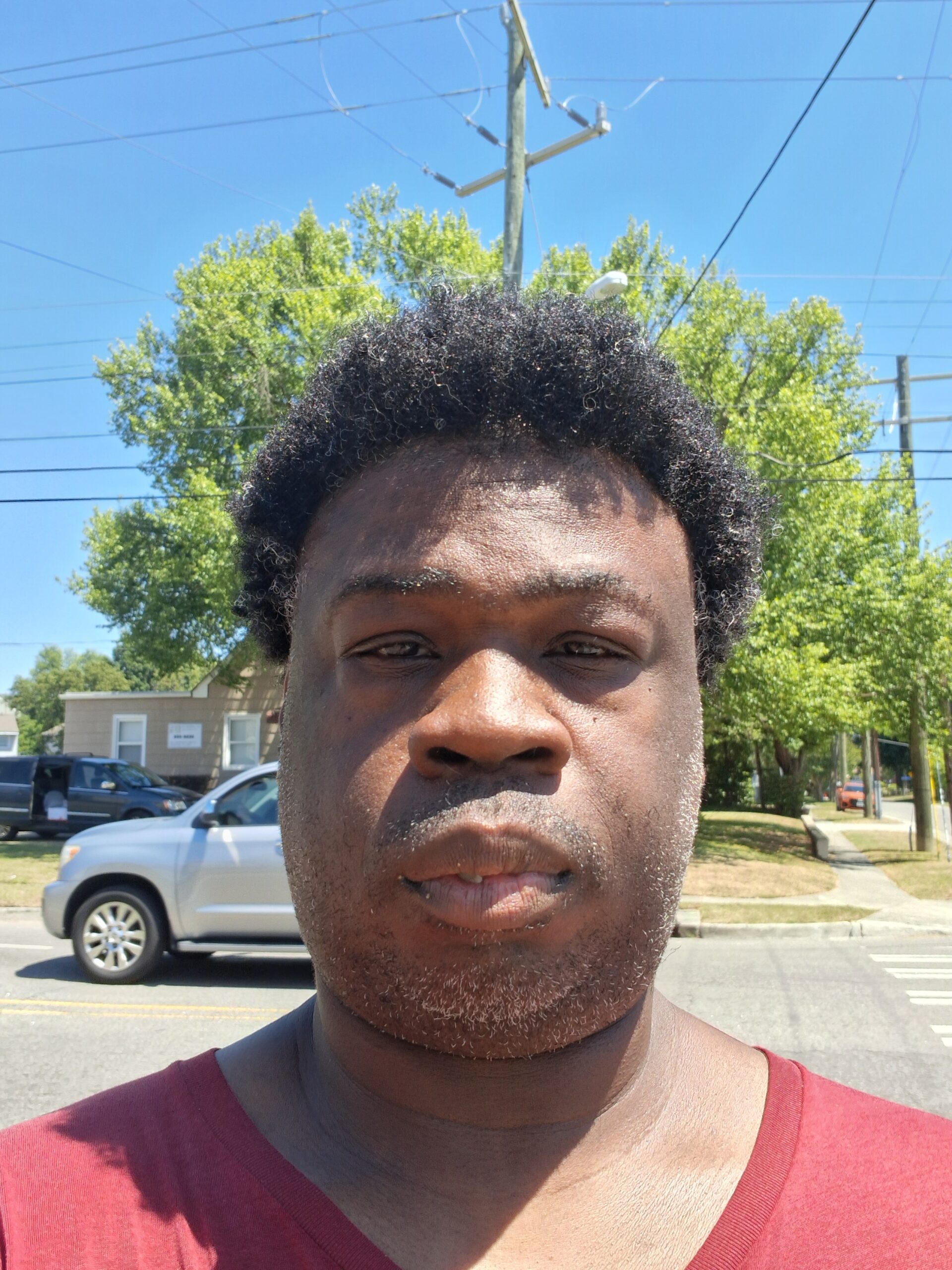 Cedric before using Pro-Line Comb Thru, natural hair uncombed outdoors